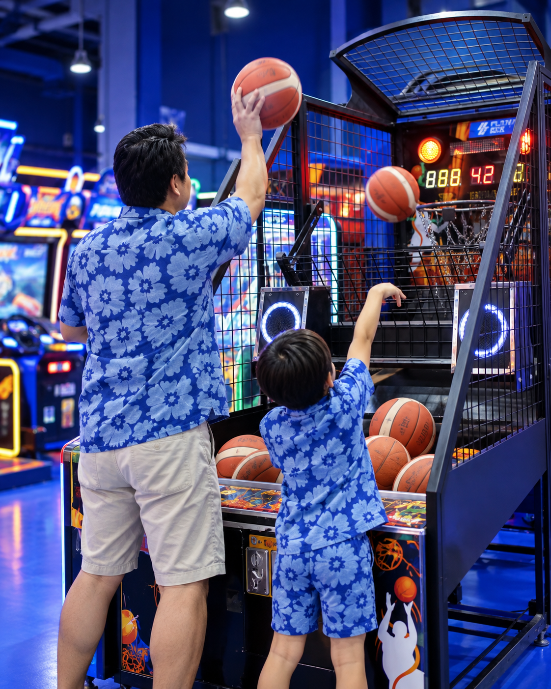 Makeio themed visual of a family playing basketball arcade games at Playerbox